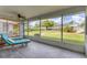 Inviting screened lanai with comfortable lounge furniture and a peaceful backyard view at 7402 8Th W Ave, Bradenton, FL 34209