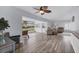 Spacious living room with hardwood floors and comfortable seating area at 7402 8Th W Ave, Bradenton, FL 34209