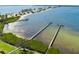 An aerial view of docks on the water in a tropical-looking waterfront community at 7523 4Th W Ave # 7523, Bradenton, FL 34209