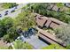Aerial view of a community with a parking lot and a road nearby at 7523 4Th W Ave # 7523, Bradenton, FL 34209