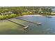 An aerial view of docks on the water in a tropical-looking waterfront community at 7523 4Th W Ave # 7523, Bradenton, FL 34209