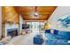 Inviting living room with cozy fireplace and sliding glass door access to the patio at 7523 4Th W Ave # 7523, Bradenton, FL 34209