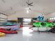Spacious boat storage area with high ceilings and ample room for kayaks and other watercraft at 813 Tailwind Pl, Sarasota, FL 34240