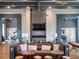 Stylish lounge with comfortable seating, modern fireplace, and elegant decor, creating a welcoming and sophisticated space at 813 Tailwind Pl, Sarasota, FL 34240