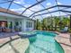 The backyard features a large, screened-in pool, a spa, and lush landscaping at 813 Tailwind Pl, Sarasota, FL 34240