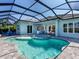Enclosed pool and spa area with outdoor seating, offering a private retreat at 813 Tailwind Pl, Sarasota, FL 34240