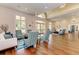 Bright and spacious clubhouse interior with stylish seating, large windows, and elegant décor for community gatherings at 8782 49Th E Ter, Bradenton, FL 34211
