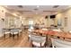 Inviting dining room boasts wood floors, ample seating, and a relaxing atmosphere at 8782 49Th E Ter, Bradenton, FL 34211