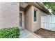 The front entryway features a decorative glass door, neutral paint, and a 'welcome' mat at 8782 49Th E Ter, Bradenton, FL 34211