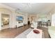 Bright living room with a seamless flow to the dining and kitchen areas, creating an ideal space for entertaining and everyday living at 8782 49Th E Ter, Bradenton, FL 34211