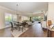 Bright living room boasts tile floors, ample seating, and access to the outdoor patio at 8782 49Th E Ter, Bradenton, FL 34211