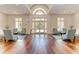 Bright and airy lobby features hardwood floors, comfortable seating and large windows at 8782 49Th E Ter, Bradenton, FL 34211