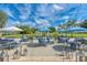 Beautifully decorated patio area with string lights, perfect for outdoor dining at 8782 49Th E Ter, Bradenton, FL 34211