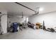 Spacious two car garage with epoxy flooring and ample storage space at 922 Fernleaf Run, Bradenton, FL 34212