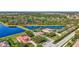 Aerial photo shows picturesque properties with community lakes, lush natural preserves, and well-maintained streets at 110 167Th E Blvd, Bradenton, FL 34212