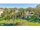 Aerial view of the home with beautiful landscaping, well-manicured lawn, and a serene setting at 110 167Th E Blvd, Bradenton, FL 34212