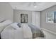 Bright bedroom with large window and closet space, creating a cozy and inviting space at 110 167Th E Blvd, Bradenton, FL 34212