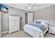 Well-lit bedroom with closet space and ensuite bathroom entrance offering convenience and comfort at 110 167Th E Blvd, Bradenton, FL 34212