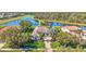 Charming home with lush landscaping, a brick walkway, and inviting entrance, in an attractive community at 110 167Th E Blvd, Bradenton, FL 34212