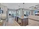 Spacious kitchen with granite countertops, stainless steel appliances, and large island at 110 167Th E Blvd, Bradenton, FL 34212