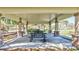 Community park pavilion with picnic tables provides a shaded area for gatherings and relaxation at 110 167Th E Blvd, Bradenton, FL 34212
