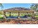 Community park picnic area featuring sheltered tables for outdoor dining and social gatherings at 110 167Th E Blvd, Bradenton, FL 34212