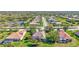 Beautiful street view of single-Gathering homes featuring well-manicured lawns and lovely landscaping at 110 167Th E Blvd, Bradenton, FL 34212
