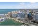 Aerial view of upscale urban landscape featuring modern condos and roadways at 111 S Pineapple Ave # 918, Sarasota, FL 34236