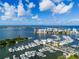 Scenic aerial shot capturing a marina, bridge, and luxury waterfront living at 111 S Pineapple Ave # 918, Sarasota, FL 34236