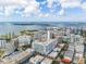 Expansive aerial view showcasing waterfront condos, bridges, and stunning bay views at 111 S Pineapple Ave # 918, Sarasota, FL 34236