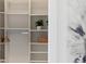 Open walk-in closet featuring a closet rod, built-in shelving, and storage at 111 S Pineapple Ave # 918, Sarasota, FL 34236