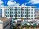 Striking condominium building featuring modern architecture and vibrant artistic accents at 111 S Pineapple Ave # 918, Sarasota, FL 34236