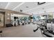 Modern gym with state-of-the-art equipment, large mirrors, and expansive windows offering nice views at 111 S Pineapple Ave # 918, Sarasota, FL 34236