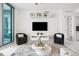 Bright living room showcasing modern design elements, cozy seating, and a stylish entertainment setup for a comfortable atmosphere at 111 S Pineapple Ave # 918, Sarasota, FL 34236