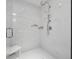 Bright shower features a bench seat, handheld, and rain shower at 111 S Pineapple Ave # 918, Sarasota, FL 34236