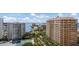 Beautiful view of the buildings, bay and palm tree lined street from this elegant high-rise condominium at 1111 Ritz Carlton Dr # 1704, Sarasota, FL 34236