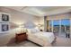 Bright bedroom with balcony and city views at 1111 Ritz Carlton Dr # 1704, Sarasota, FL 34236