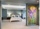 This spacious main bedroom with cool colors and a king bed is a relaxing retreat at 1111 Ritz Carlton Dr # 1704, Sarasota, FL 34236