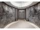 Stylish entryway with stone floors, modern lighting, and artistic wall decor for a grand entrance at 1111 Ritz Carlton Dr # 1704, Sarasota, FL 34236