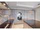 Modern kitchen features granite countertops, stainless steel appliances, and ample cabinet space at 1111 Ritz Carlton Dr # 1704, Sarasota, FL 34236