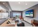 This comfortable living room offers great views through the sliding glass doors and a large sectional at 1111 Ritz Carlton Dr # 1704, Sarasota, FL 34236