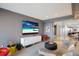 This stylish living room has unique grey walls, modern furniture and opens to a large foyer at 1111 Ritz Carlton Dr # 1704, Sarasota, FL 34236