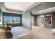 This spacious main bedroom features a king bed, city views, and an ensuite bathroom at 1111 Ritz Carlton Dr # 1704, Sarasota, FL 34236