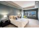 This relaxing main bedroom has cool colors, a king bed and a wonderful city view at 1111 Ritz Carlton Dr # 1704, Sarasota, FL 34236