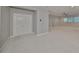 Large bonus room with neutral paint, carpet, and natural light at 11408 Drifting Leaf Dr, Riverview, FL 33579