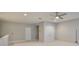Open bonus room with ceiling fan and closet at 11408 Drifting Leaf Dr, Riverview, FL 33579