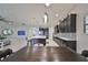 Bright, modern kitchen with a large island, stainless steel appliances, and open layout at 11408 Drifting Leaf Dr, Riverview, FL 33579