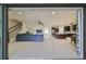 Expansive open-concept living area with seamless flow to the kitchen, perfect for modern living at 11408 Drifting Leaf Dr, Riverview, FL 33579