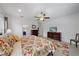 The main bedroom has a ceiling fan and an en-suite bathroom offering a private sanctuary for relaxation and rejuvenation at 12225 Whisper Lake Dr, Bradenton, FL 34211