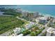 Coastal building near the ocean, offering beach access and luxurious amenities at 129 Taft Dr # W102, Sarasota, FL 34236